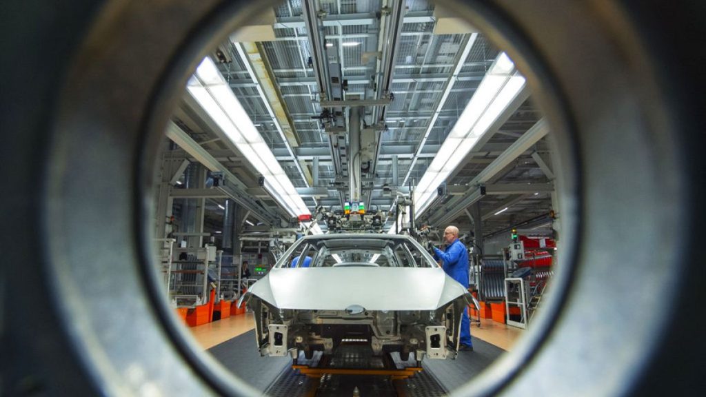 Workers complete car bodies (Golf VII) at the plant of the German manufacturer Volkswagen AG in Zwickau, Germany, Monday, Jan. 22, 2018.