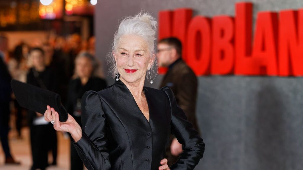 Helen Mirren poses for photographers upon arrival at the premiere of