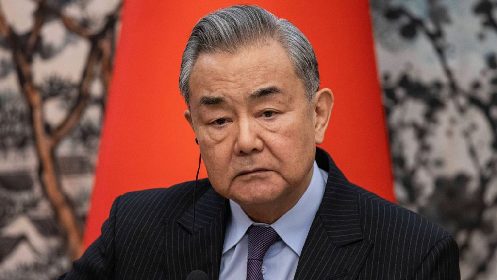 Chinese Foreign Minister Wang Yi participates in a press conference in Beijing, 27 March, 2025
