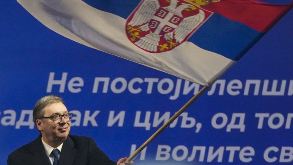 FILE - Serbian President Aleksandar Vucic waves a Serbian flag after a rally in a central town of Jagodina, Serbia, Friday, Jan. 24, 2025