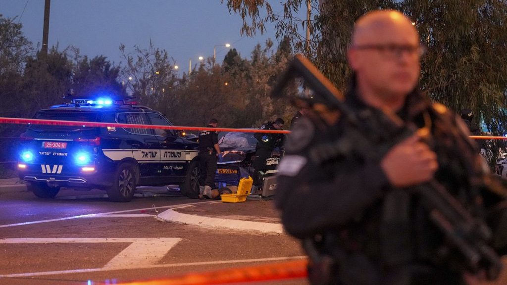 FILE: Israeli police officers at the scene of a suspected car ramming attack near Gan Shmuel, 27 February 2025