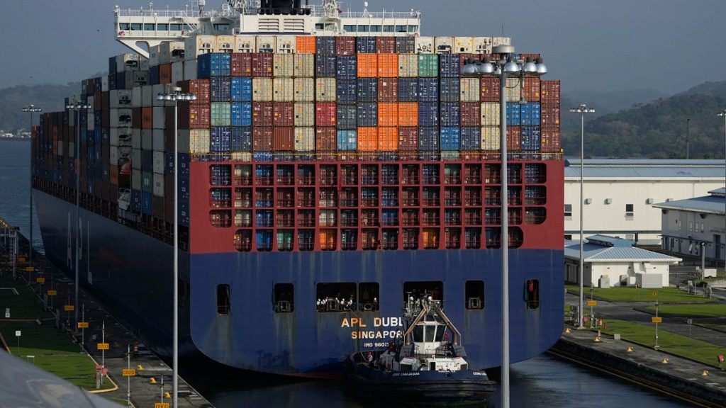 A cargo ship goes through the Panama Canal