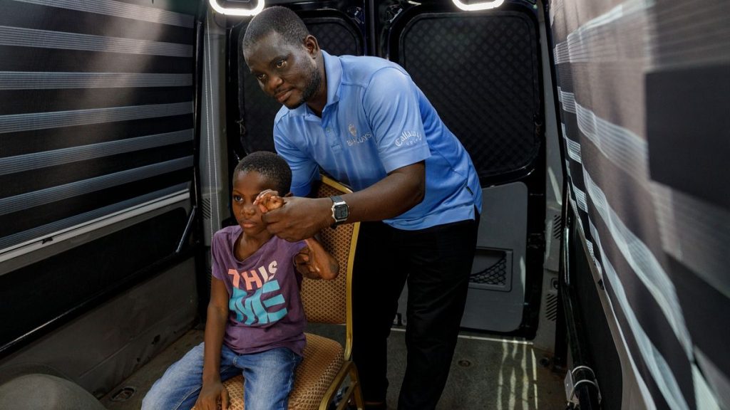 Rita Zaansuma-Naporo, 9, accompanied by her father, attends a live trial of 3D telemedicine technology at Koforidua Hospital, Ghana, Tuesday, Feb. 25, 2025.