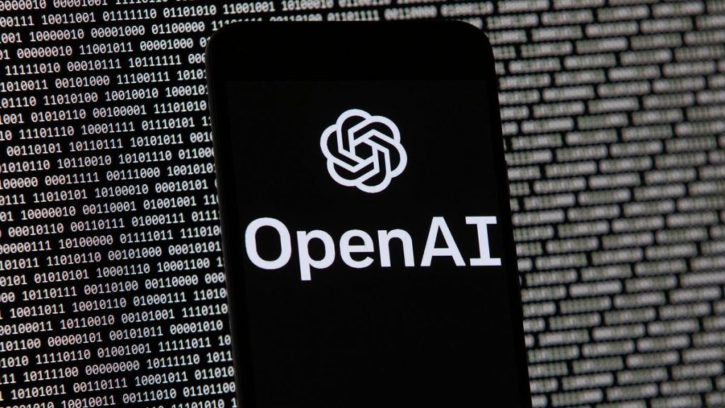 FILE - The OpenAI logo appears on a mobile phone in front of a computer screen with random binary data, March 9, 2023, in Boston.