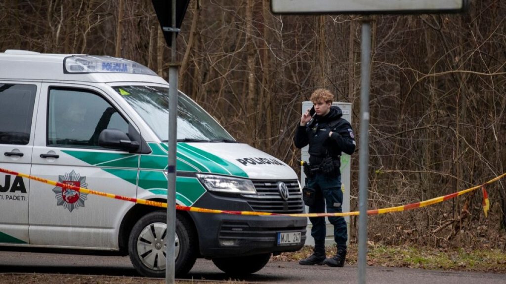 Police officers patrol near the house of Leonid Volkov, a close associate of the late Russian opposition leader Alexei Navalny, in Vilnius, Lithuania, March 13, 2025.