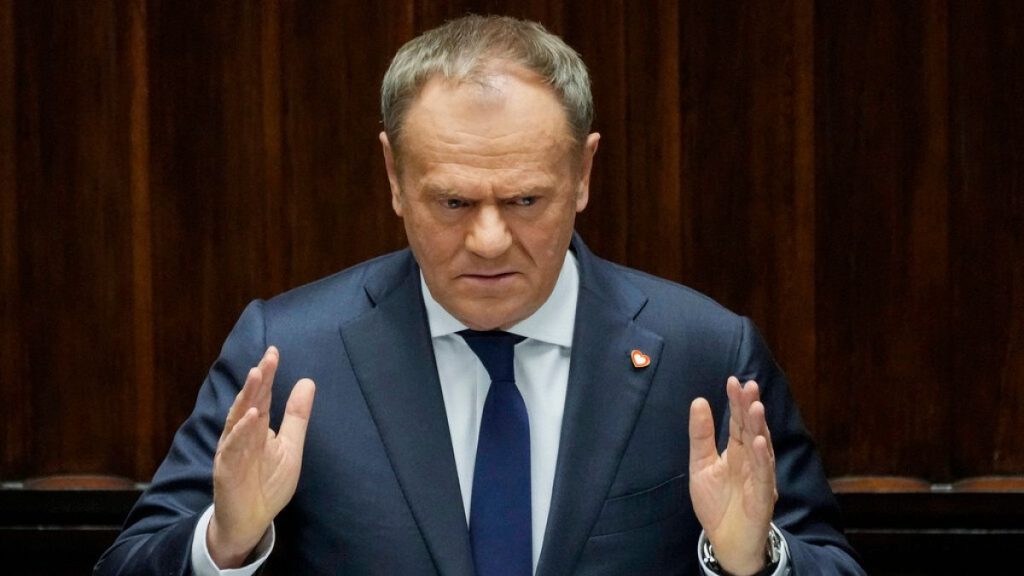 Polish Prime Minister Donald Tusk speaks at the Sejm, the lower house of parliament, in Warsaw, Poland, Friday March 7, 2025.