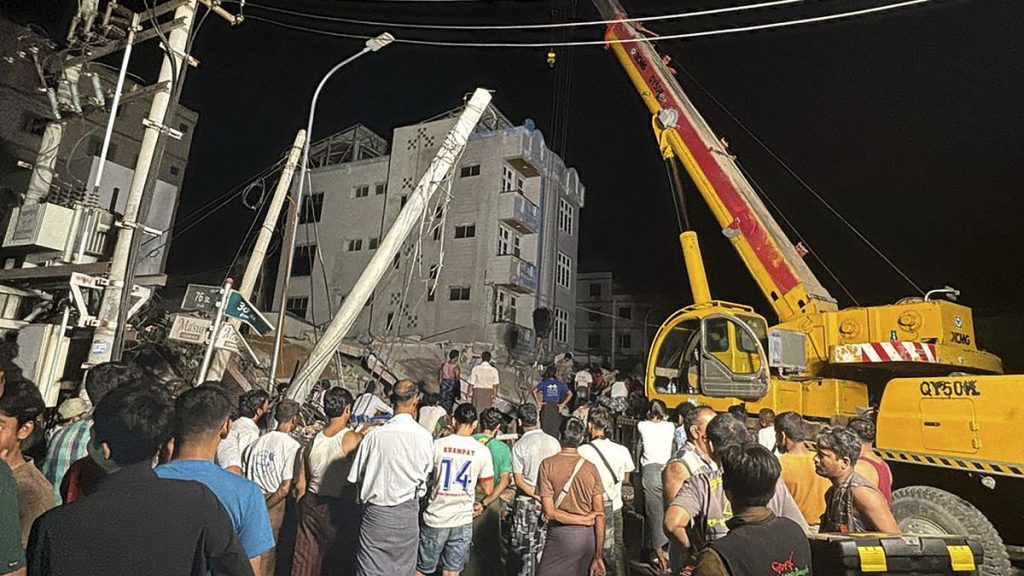 Volunteers work at an earthquake affected area in Mandalay, 29 March, 2025