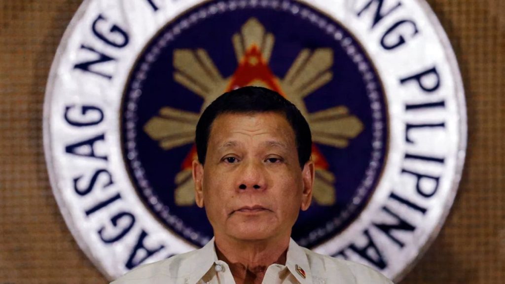 FILE: Philippine President Rodrigo Duterte stands in front of the presidential seal at the Malacanang presidential palace in Manila, 18 July 2017