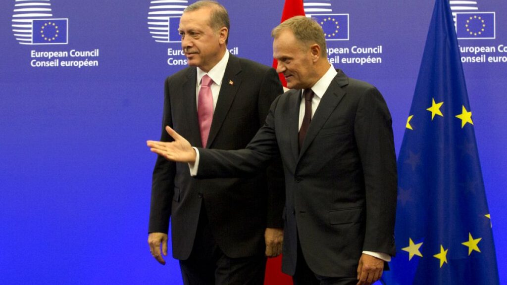 Turkish President Recep Tayyip Erdogan greeted by European Council President Donald Tusk prior to a meeting at the EU Council building in Brussels on Monday, Oct. 5, 2015.