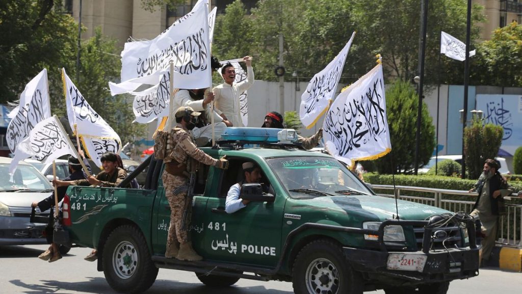 Taliban fighters celebrate the third anniversary of the withdrawal of US-led troops from Afghanistan, in Kabul, Afghanistan, 14 August 2024.