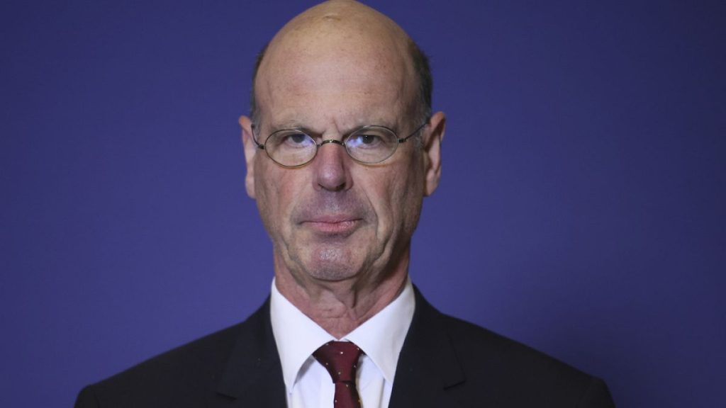 Newly named finance minister Eric Lombard poses after the handover ceremony Monday, Dec. 23, 2024 in Paris.