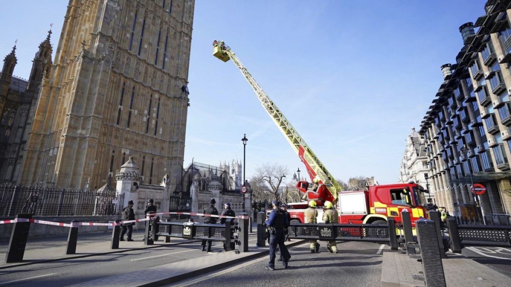 Emergency services at the Palace of Westminster in London after man with a Palestine flag climbed up Elizabeth Tower, which houses Big Ben,Saturday, March 8, 2025.