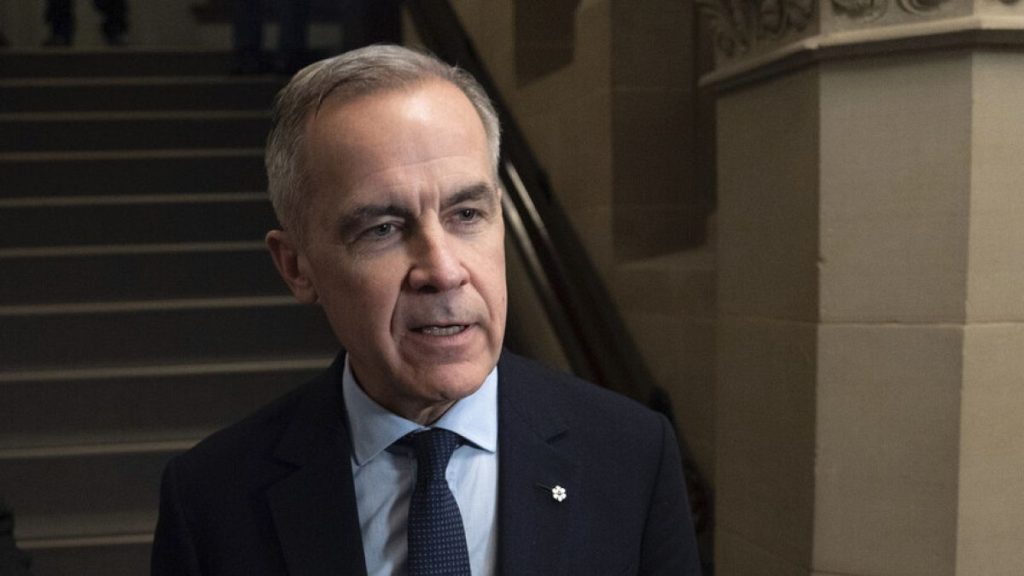 Canada Liberal leader Mark Carney speaks briefly with media as he makes his way to a caucus meeting on Monday, March 10, 2025, in Ottawa