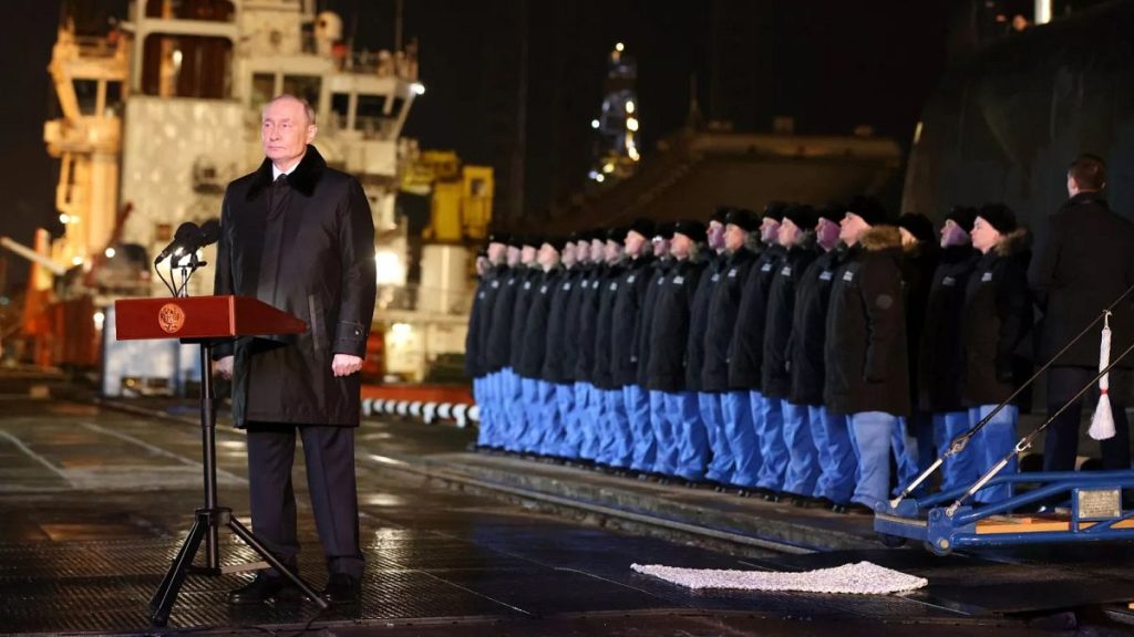 Russian President Vladimir Putin attends a ceremonial ship launching for the nuclear-powered submarine Perm in Murmansk, 27 March 2025