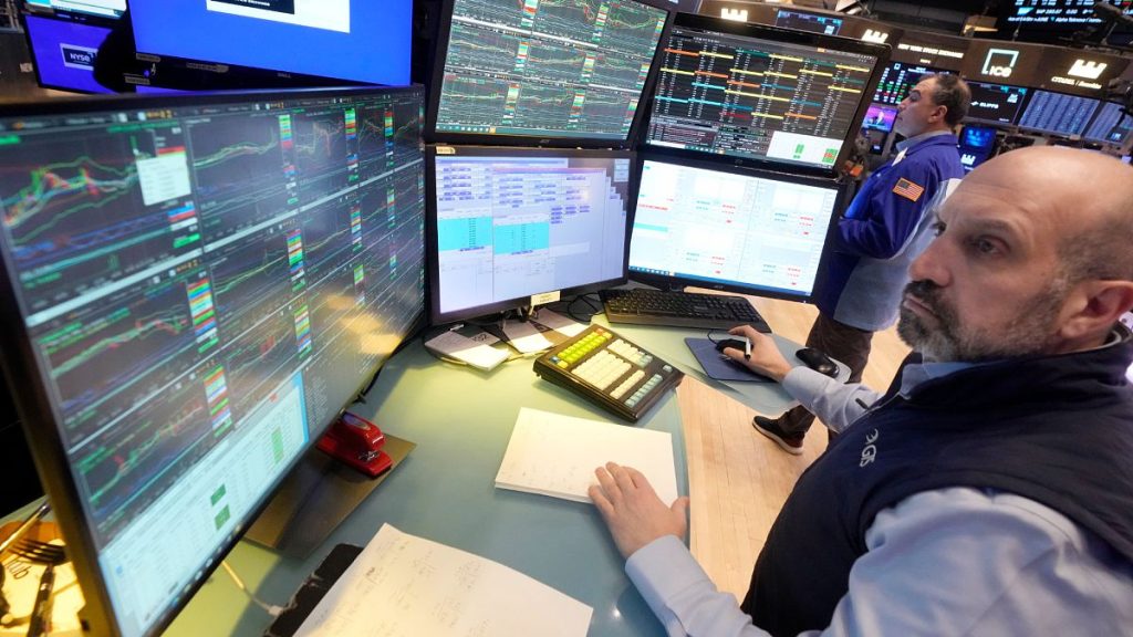Specialist James Denaro works on the floor of the New York Stock Exchange. 12 March 2025.