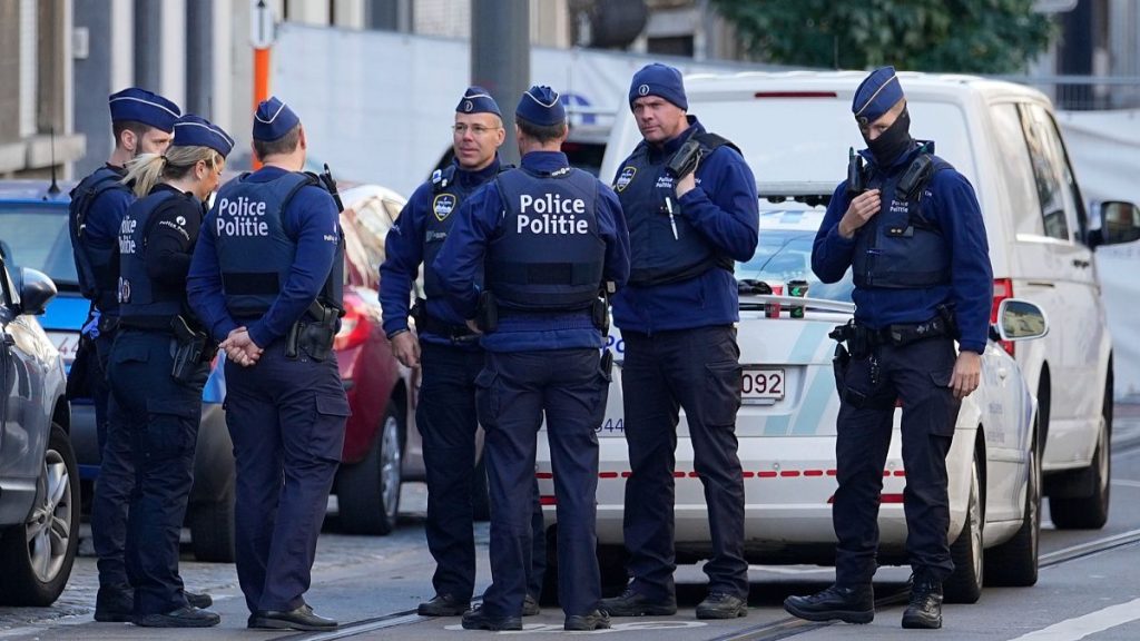 FILE: Belgian Police patrol behind a cordoned off area in Brussels, 17 October 2023