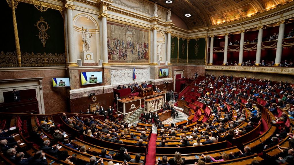 Ukrainian President Volodymyr Zelenskyy addresses Parliament Members in the French National Assembly, Wednesday, March 23, 2022 in Paris.