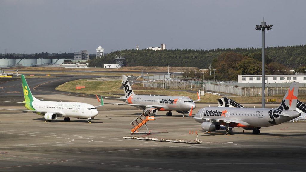 JetStar Airways airplanes are pictured at Narita International Airport, Japan, on 19 November, 2020.