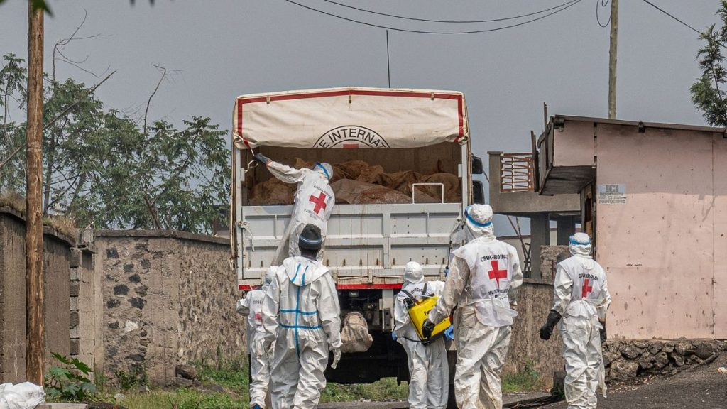 Red Cross personnel load bodies of victims of the fighting between Congolese government forces and M23 rebels in Goma, 3 Feb 2025.