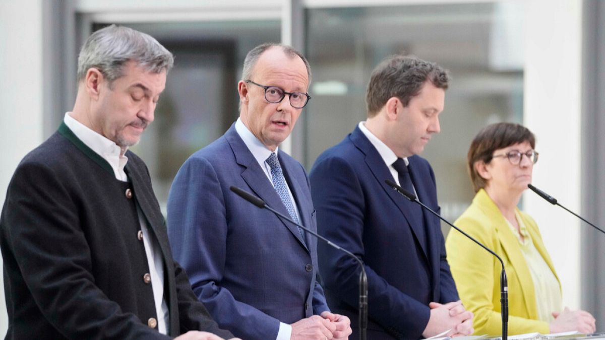 Markus Soeder, chairman of Bavarians Christian Social Union party, Christian Democratic Union party chairman Friedrich Merz and the Social Democratic Party leaders, March 8.