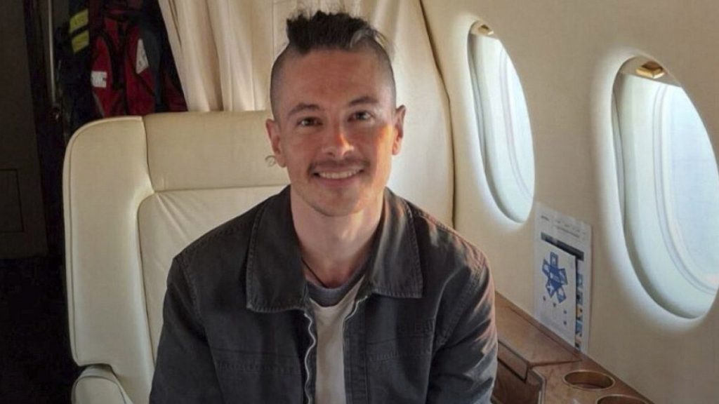 French citizen Olivier Grondeau is pictured on a plane after being freed by Iran.