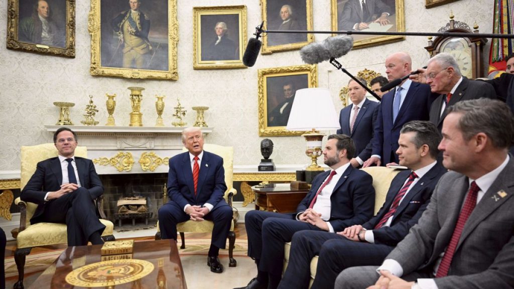 President Donald Trump speaks during a meeting with NATO Secretary General Mark Rutte, left, as White House national security adviser Mike Walz, seated from right,
