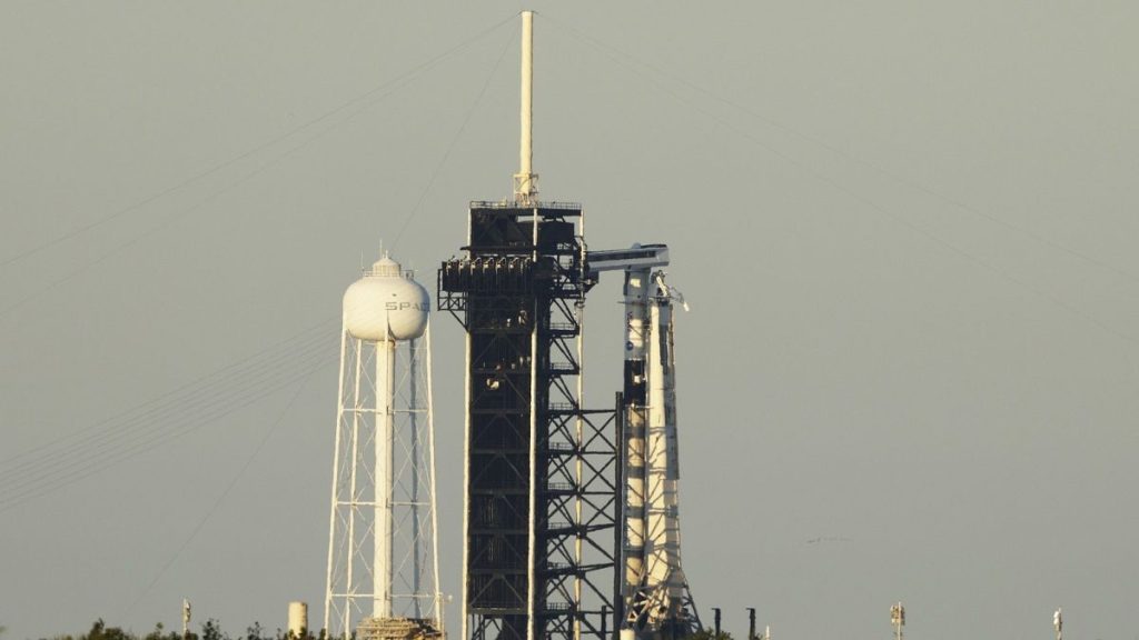 A SpaceX Falcon 9 rocket with a crew of four aboard the Crew Dragon spacecraft scrubbed prior to liftoff for a mission to the ISS from pad 39A at the Kennedy Space Center.