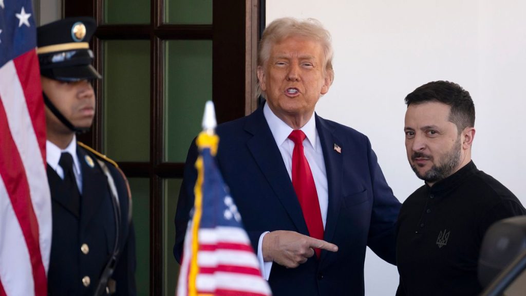 Ukraine President Volodymyr Zelenskyy, right, is greeted by President Donald Trump, center, as he arrives at the White House in Washington, Friday, Feb. 28, 2025.