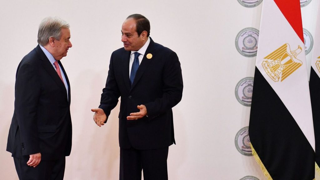Egyptian President Abdel-Fattah el-Sissi greets UN Secretary General Antonio Guterres during the emergency Arab summit just outside Cairo, 4 March 2025