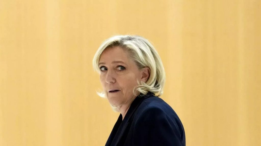 FILE- French far-right leader Marine Le Pen arrives at the courtroom for the trial over the suspected embezzlement of European Parliament funds, Wednesday, Nov. 6, 2024.