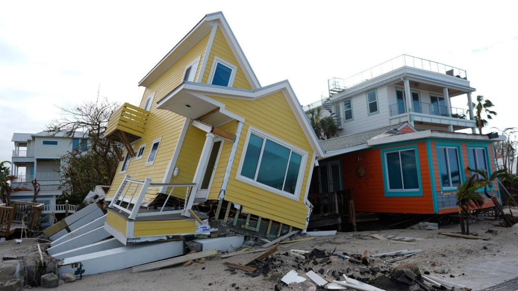 A house lies toppled off its stilts after the passage of Hurricane Milton, in Bradenton Beach on Anna Maria Island, Florida, 10 October, 2024.