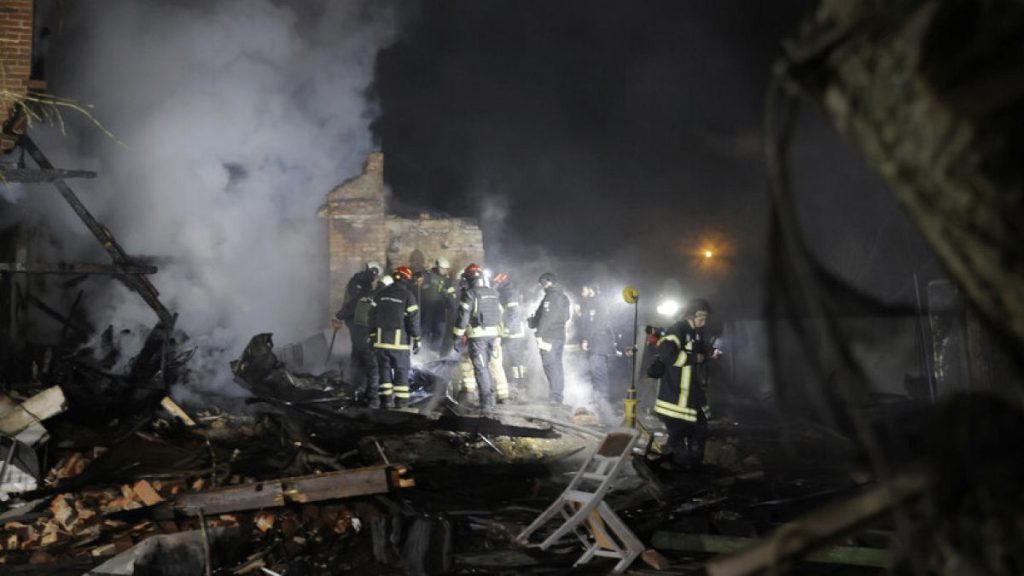 Firefighters put out a fire following Russia