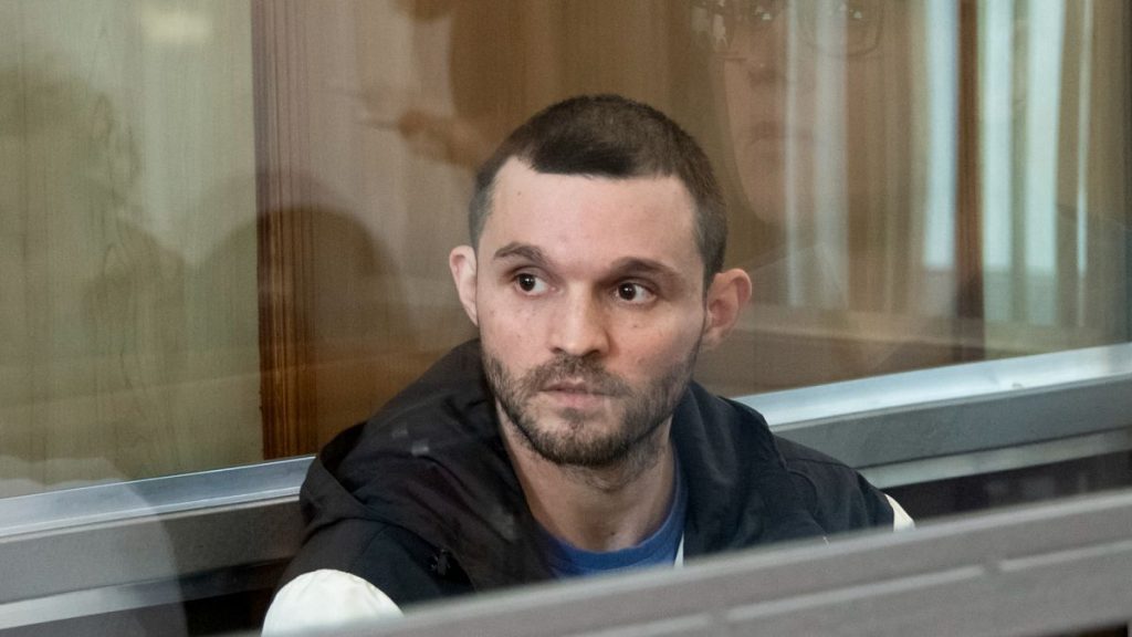 US Army Staff Sergeant Gordon Black sits in a glass cage in a courtroom in Vladivostok, 19 June, 2024