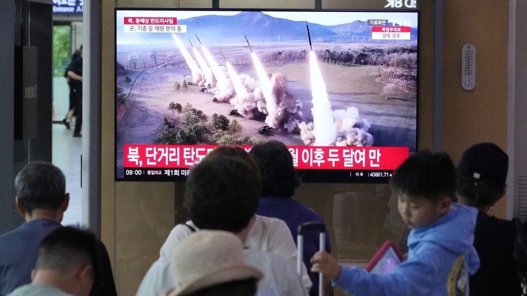 A TV screen shows a North Korean missiles launch during a news programme at Seoul Railway Station, 12 September, 2024