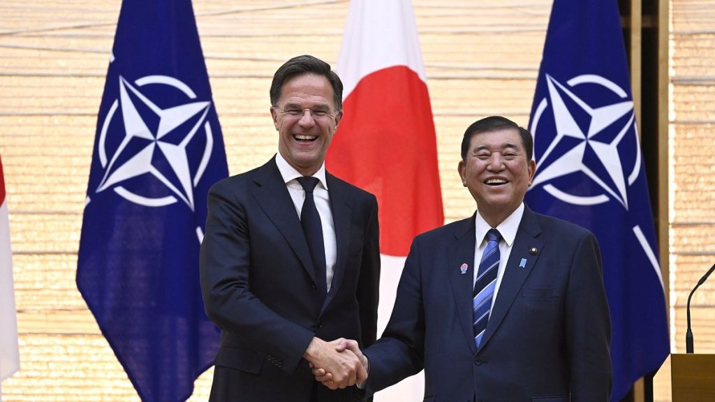 Japanese Prime Minister Ishiba Shigeru and NATO Secretary General Mark Rutte shake hands in Tokyo, 9 April, 2025