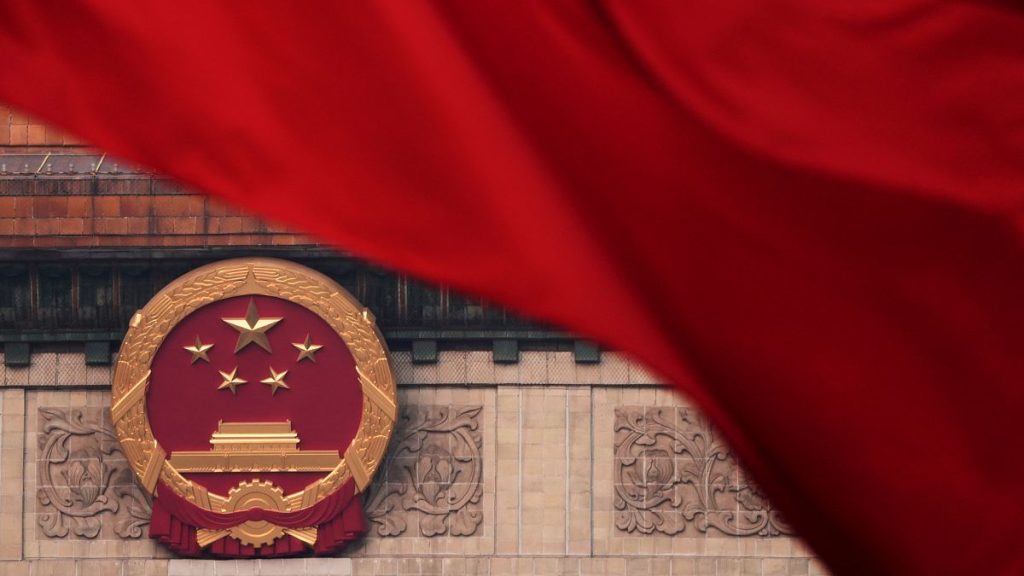 Chinese flags flutter outside the Great Hall of the People in Beijing, 10 March, 2025