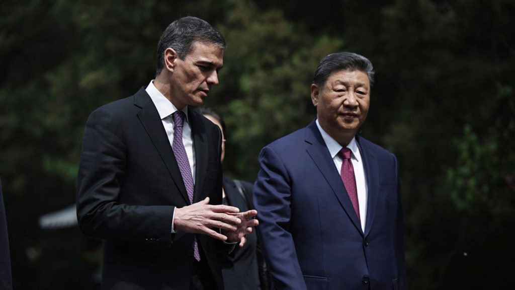 Chinese President Xi Jinping and Spanish Prime Minister Pedro Sanchez walk in the gardens of Diaoyutai Guest House in Beijing, 11 April, 2025