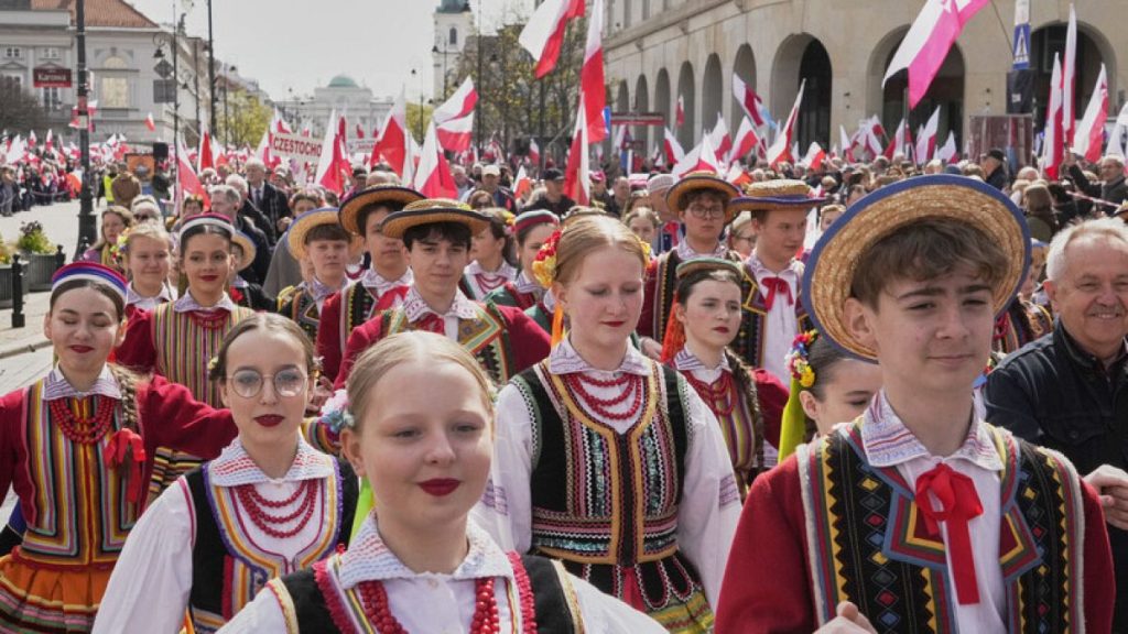 Poles dance the Polonaise in a patriotic demonstration celebrating 1,000 years since the coronation of the first Polish king, Warsaw, Poland, Saturday, April 12, 2025