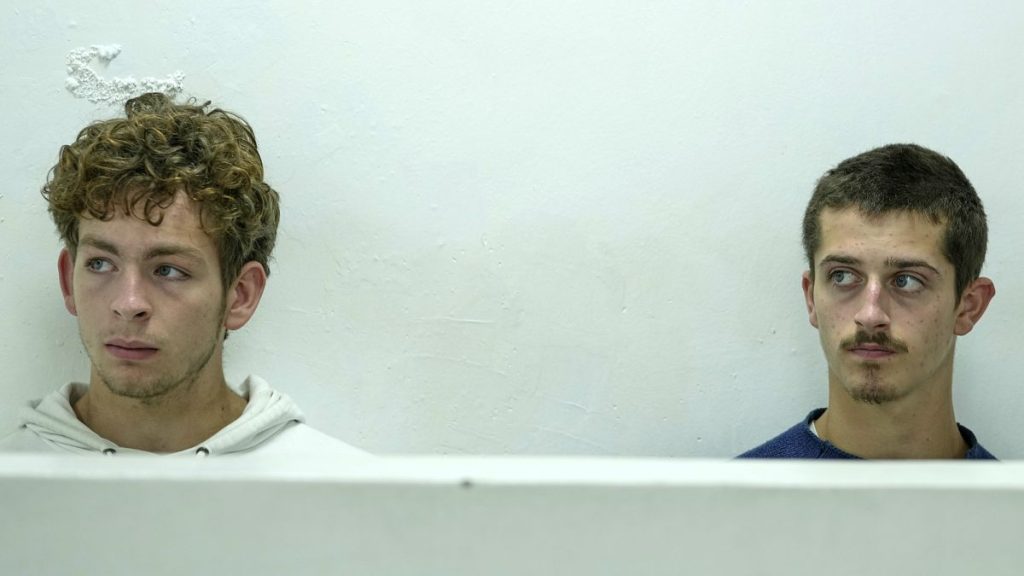 Belgian nationals Lornoy David, left, and Seppe Lodewijckx, right, at the Jomo Kenyatta International Airport Law Courts in Nairobi, 15 April, 2025