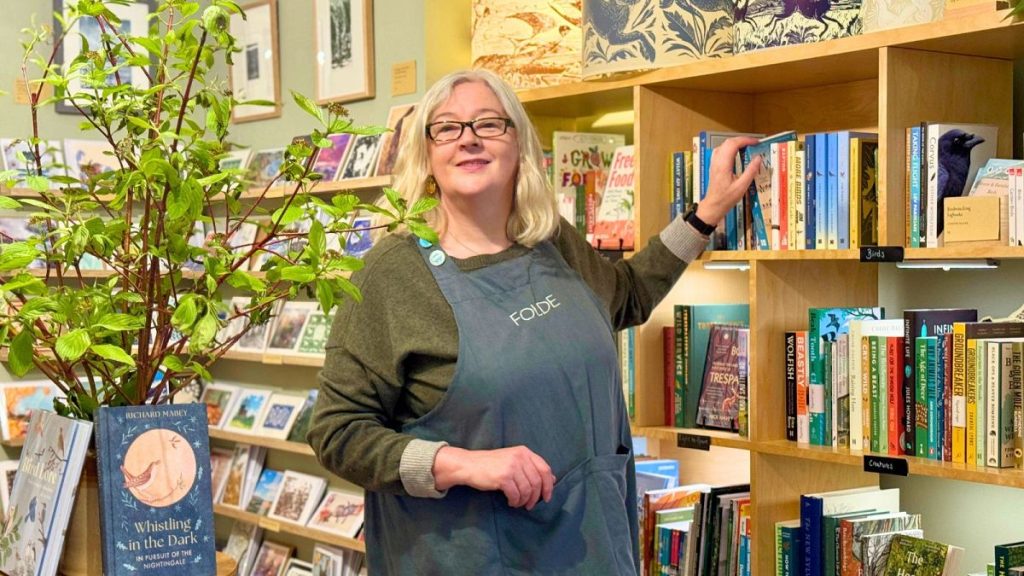 Amber at FOLDE bookshop - one of three UK bookshops providing climate hope.