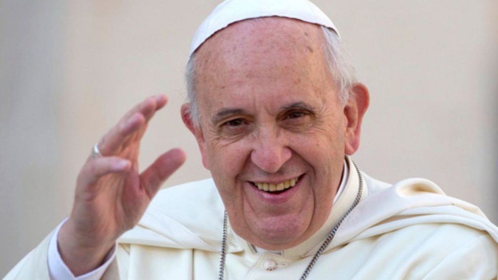 Pope Francis delivers his blessing as he arrives to hold his weekly general audience, in St. Peter