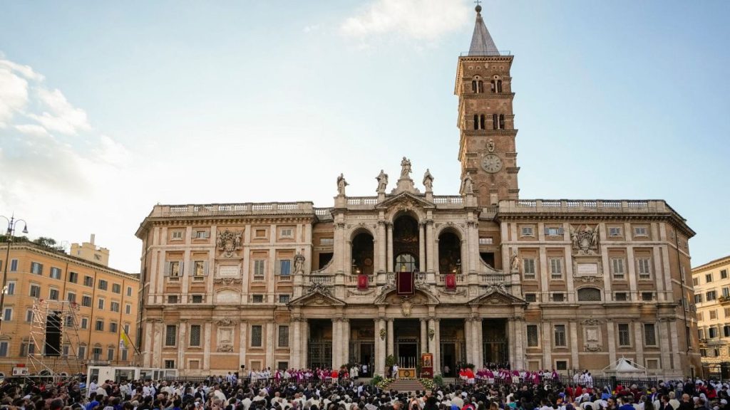 Faithful gather in front of St. Mary Major Basilica in Rome.