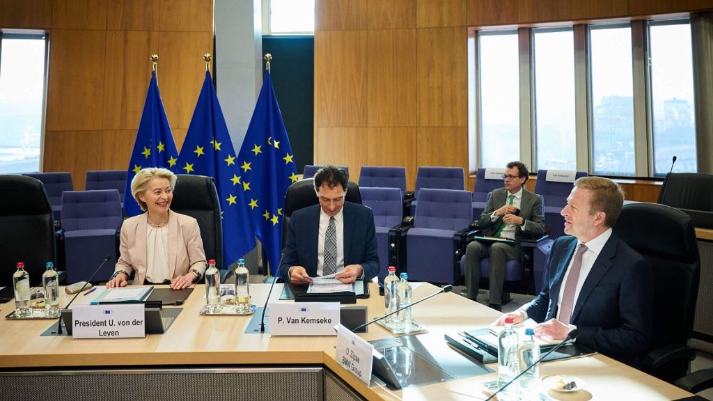 (L-R) European Commission president Ursula von der Leyen, cabinet Peter Van Kemseke, and Oliver Zipse, CEO of BMW at a