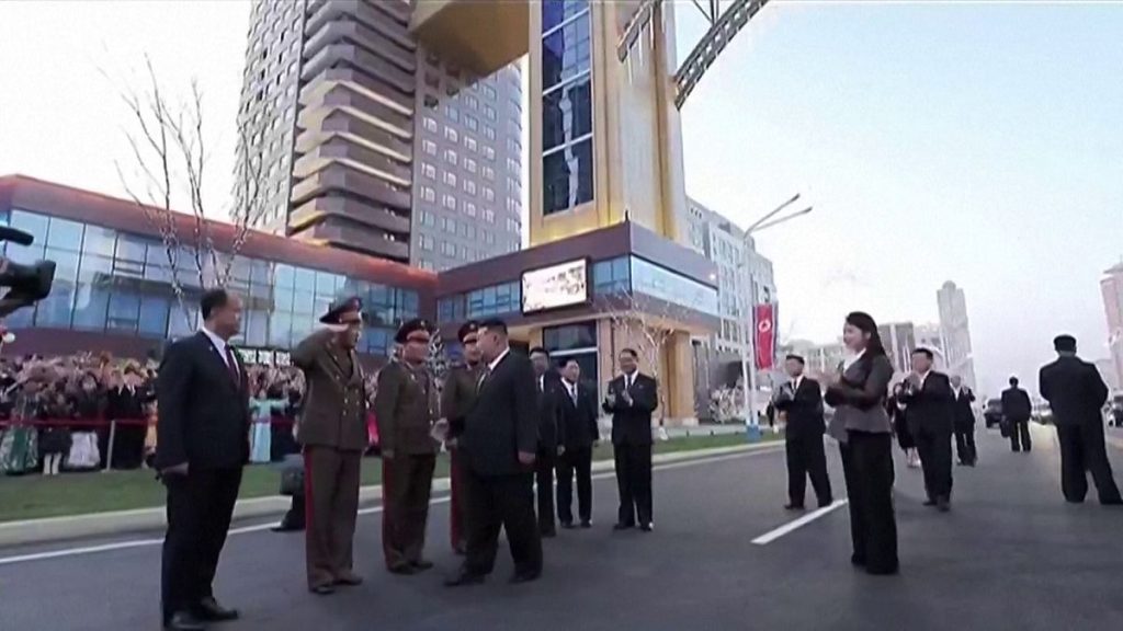North Korean leader Kim Jong Un getting out of car and greeting officials, with his daughter Kim Ju Ae standing behind him. 15.04.2025