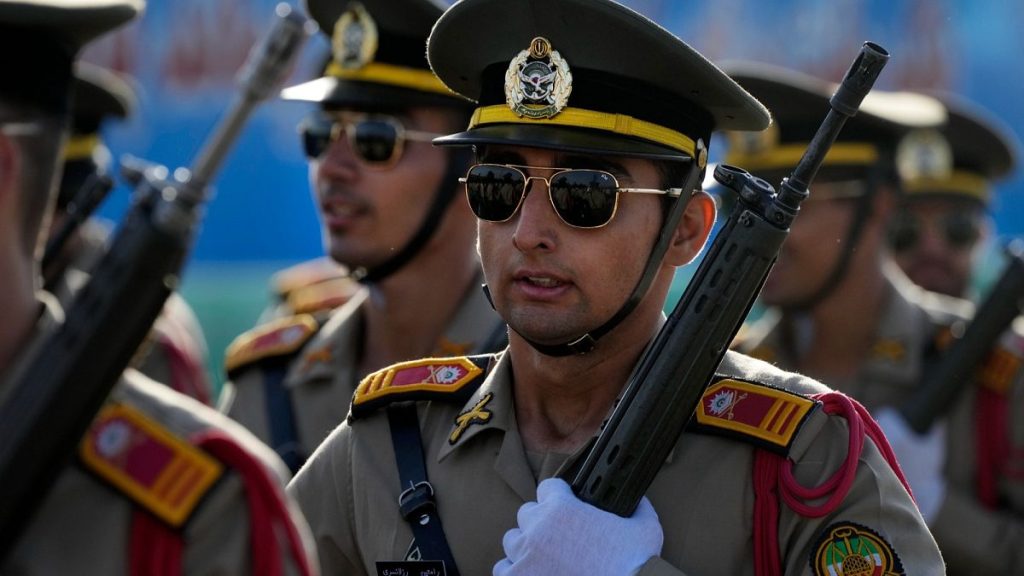 Iranian army cadets march during an annual military parade just outside Tehran, 21 September 2024