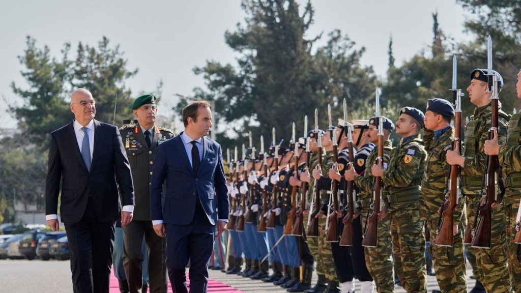 Greek Defence Minister Nikos Dendias and his French counterpart Sebastien Lecornu inspect the guard of honour before their meeting in Athens, Greece, 14 April 2025.