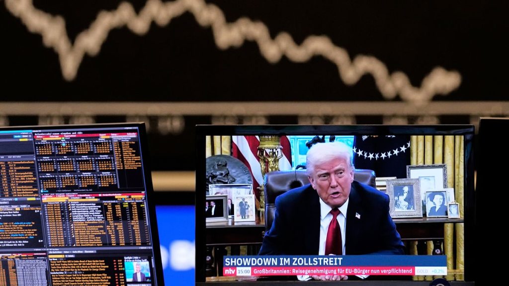 Us President Donald Trump appears on a television screen at the stock market in Frankfurt, Germany, Wednesday, April 2, 2025.