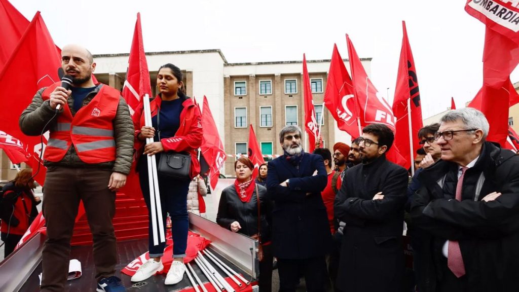 A protest organised by the CGIL trade union in front of the Latina court south of Rome.