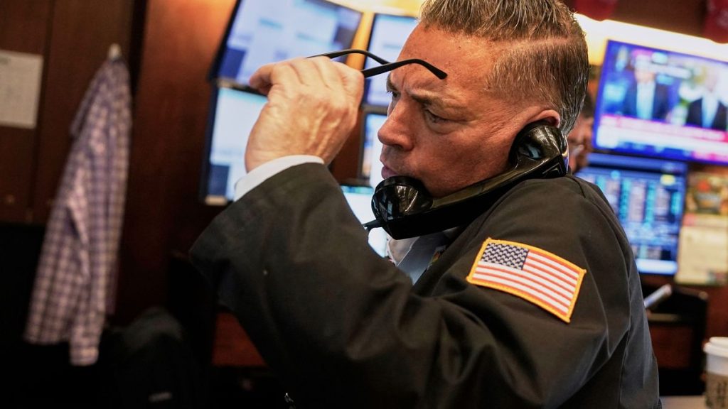 Trader Jonathan Mueller works on the floor of the New York Stock Exchange, Thursday, April 10, 2025.