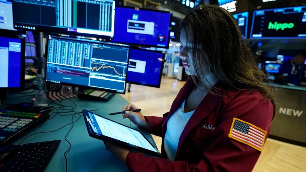 Trader Ashley Lara works on the floor of the New York Stock Exchange, Tuesday, Aug. 3, 2021.